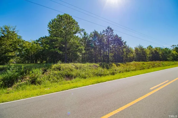 a view of a lake with a big yard