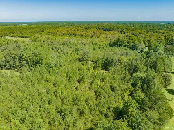 a view of a field with an outdoor space