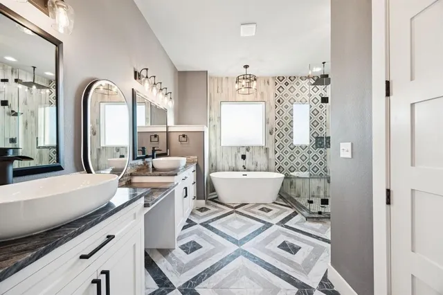 a bath room with a bath tub and a shower