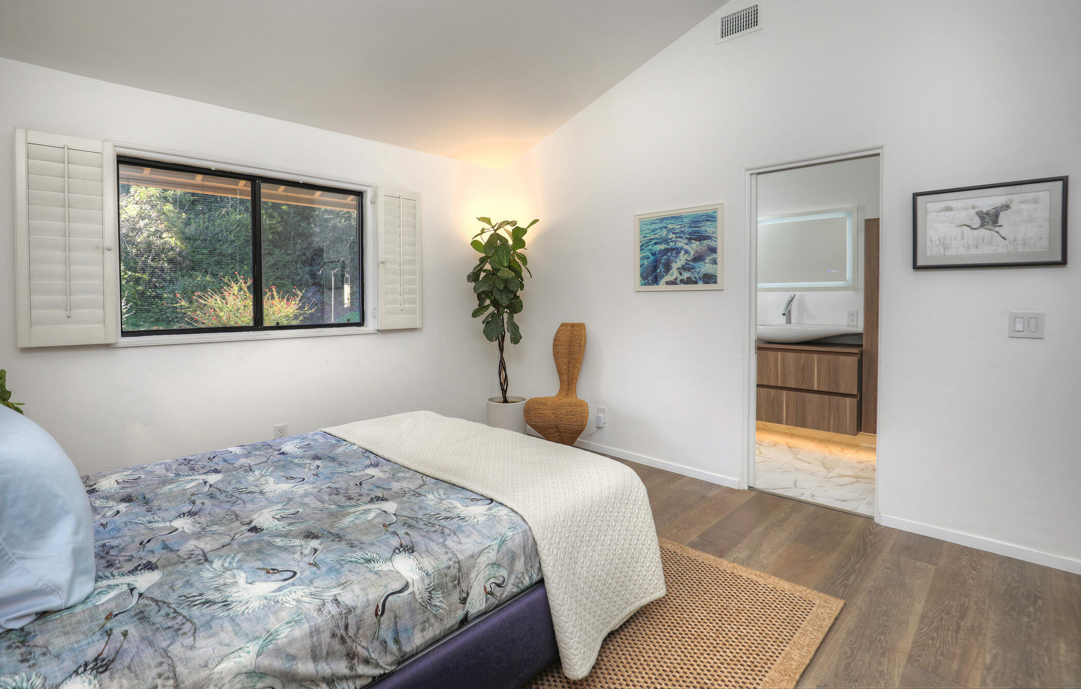 5290 Overpass Road, Unit 4 Goleta, CA 93111 - Photo 6 of 21 a bedroom with a large bed and a window