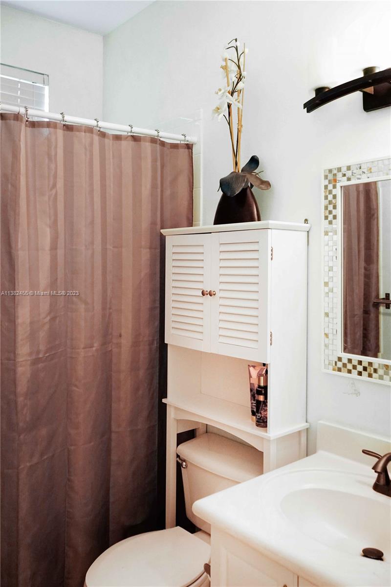 Miramar Miramar, FL 33029 - Photo 11 of 18 a bathroom with a sink and a mirror