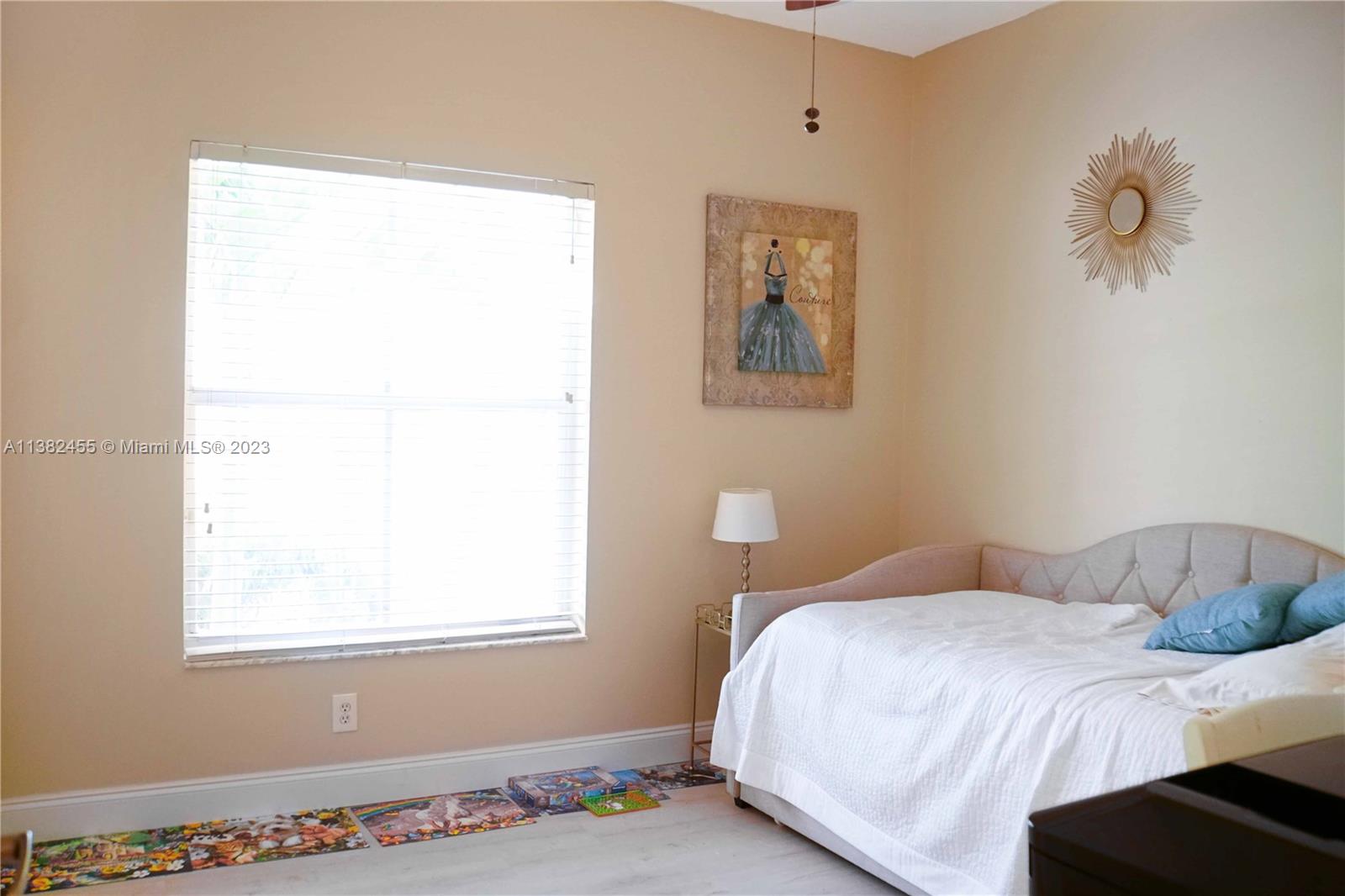 Miramar Miramar, FL 33029 - Photo 12 of 18 a bedroom with a bed and a window