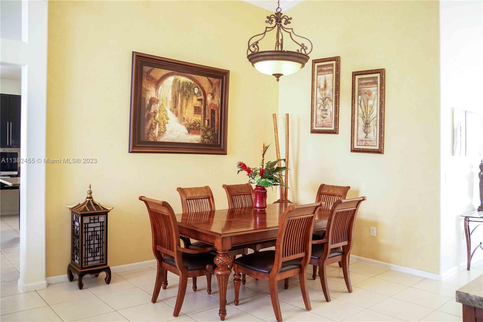 Miramar Miramar, FL 33029 - Photo 16 of 18 a view of a dining room with furniture and chandelier