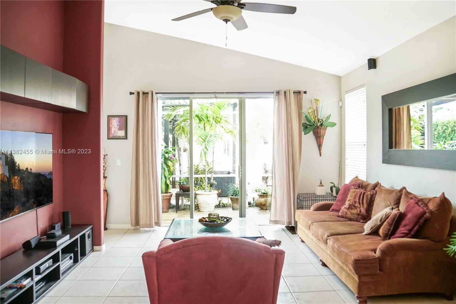 Miramar Miramar, FL 33029 - Photo 17 of 18 a living room with furniture and a flat screen tv