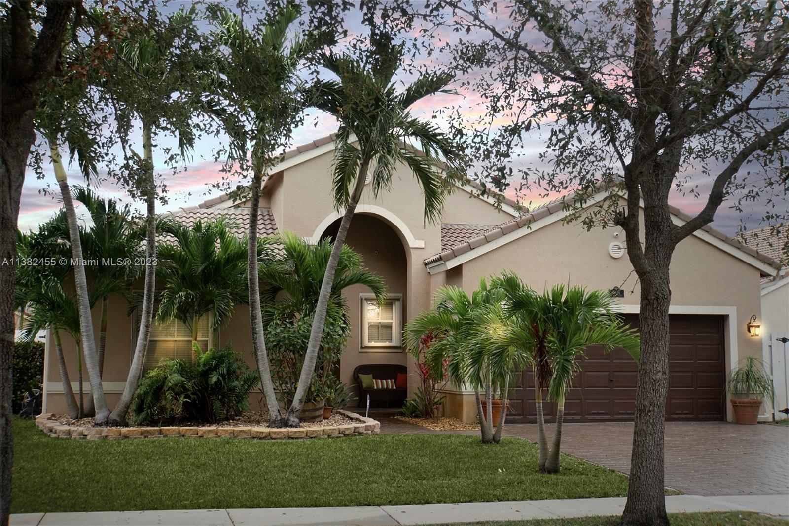 Miramar Miramar, FL 33029 - Photo 2 of 18 a front view of multi story residential apartment building with yard and green space
