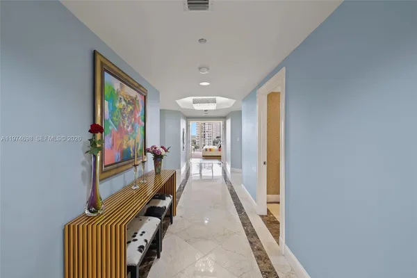 a view of a hallway with workspace