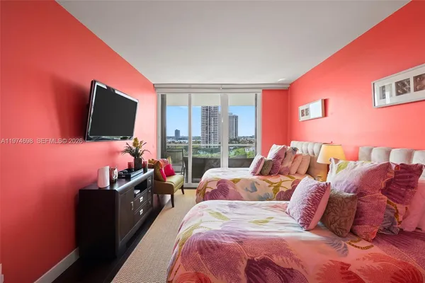 a living room with a couch and a flat screen tv