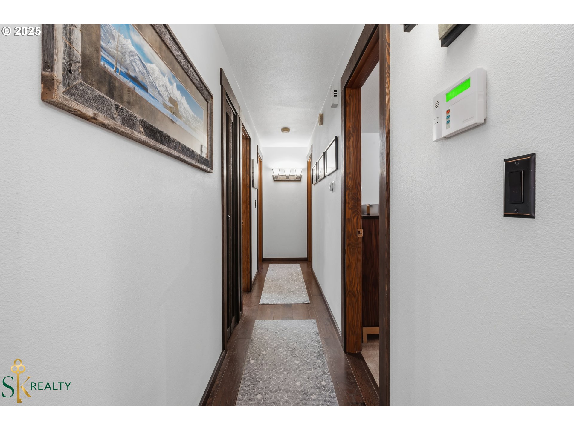2555 Northwest Squire Place Albany, OR 97321 - Photo 23 of 44 a view of a hallway with wooden floor
