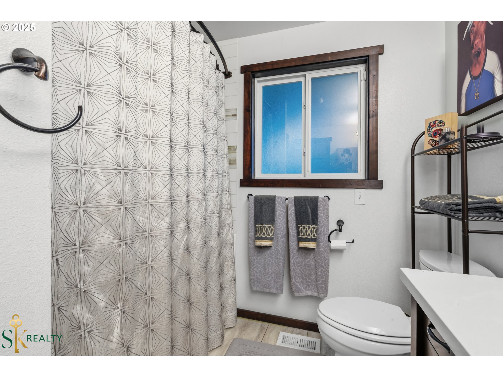 2555 Northwest Squire Place Albany, OR 97321 - Photo 27 of 44 a bathroom with a sink toilet and mirror