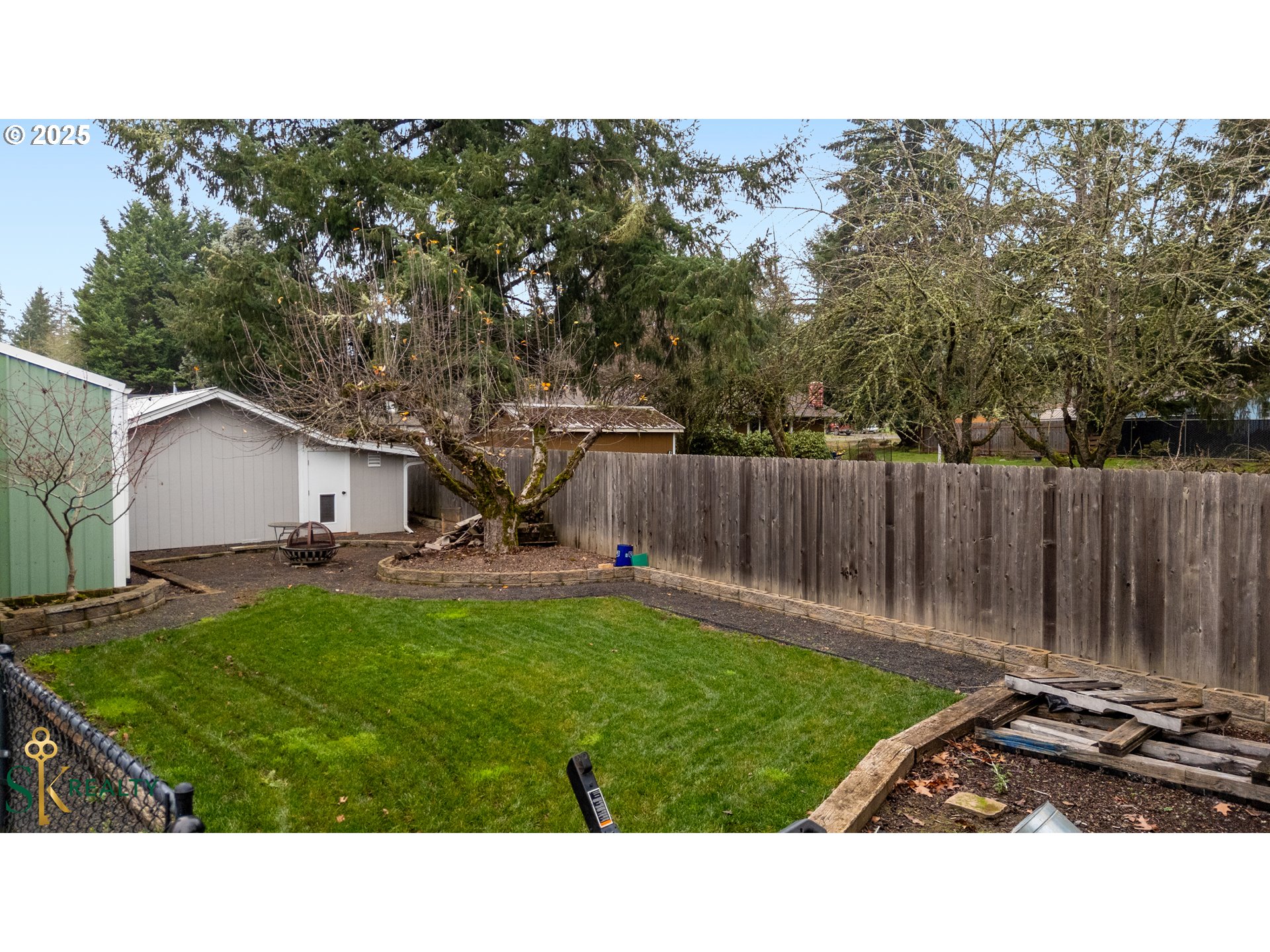 2555 Northwest Squire Place Albany, OR 97321 - Photo 38 of 44 a backyard of a house with table and chairs