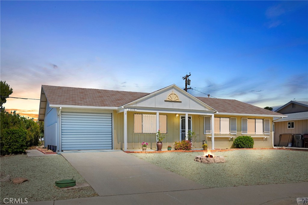26310 Ridgemoor Road Menifee, CA 92586 - Photo 1 of 1 a front view of a house with yard patio and glass windows