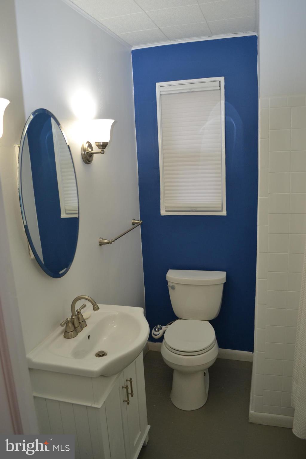 6801 Adelphi Road University Park, MD 20782 - Photo 12 of 30 The first bathroom has a tub and shower.