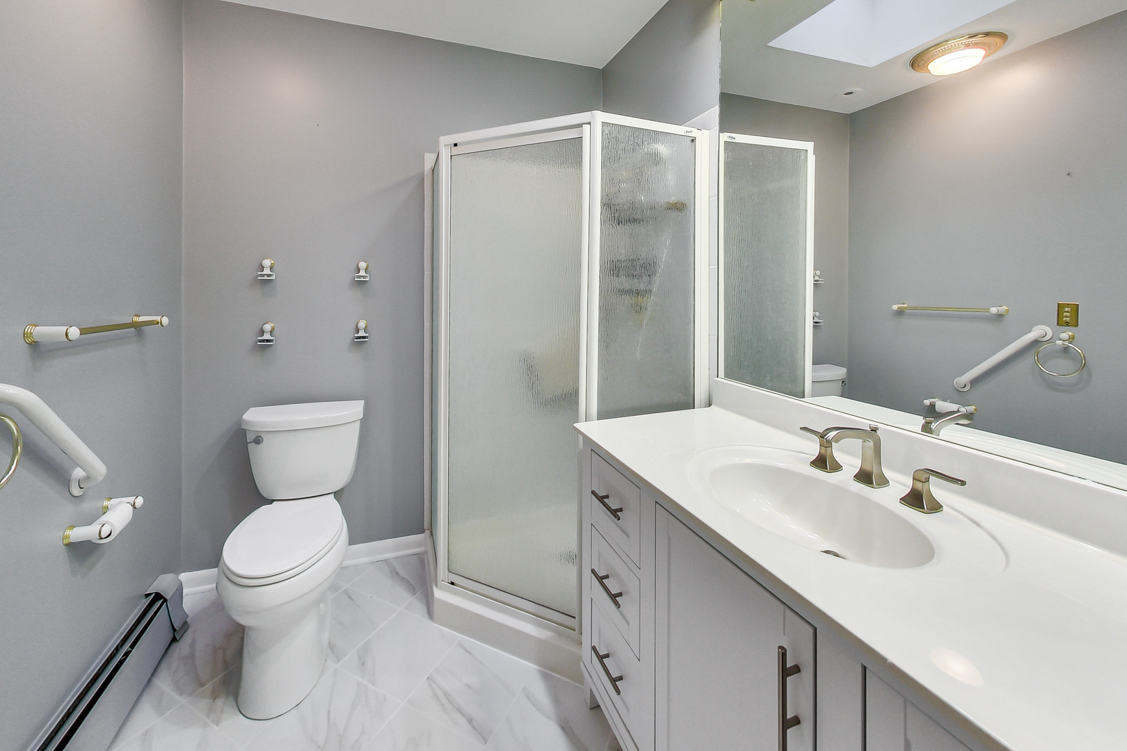 220 South Rose Avenue Park Ridge, IL 60068 - Photo 11 of 25 a bathroom with a sink toilet and shower