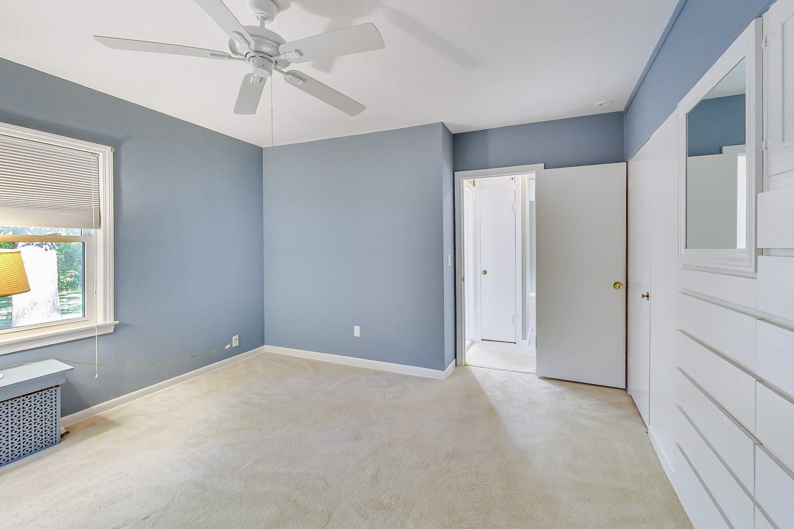 220 South Rose Avenue Park Ridge, IL 60068 - Photo 12 of 25 a view of an empty room with a window