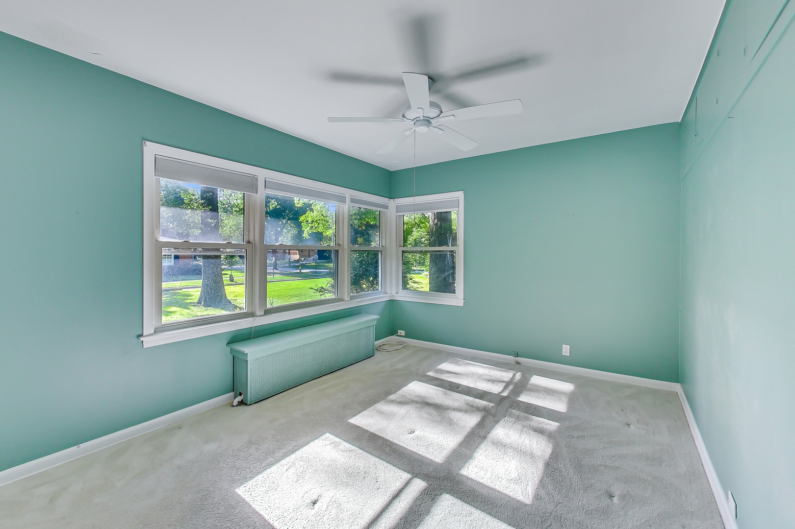 220 South Rose Avenue Park Ridge, IL 60068 - Photo 14 of 25 a bedroom with a bed and a window