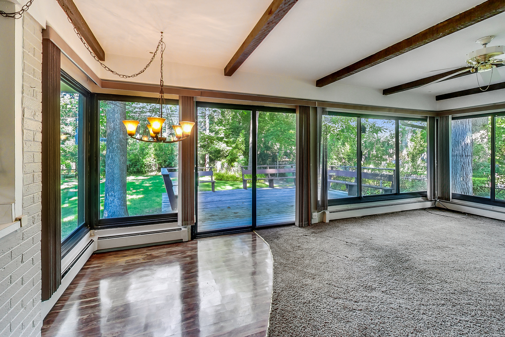 220 South Rose Avenue Park Ridge, IL 60068 - Photo 9 of 25 a view of a room with wooden floor and windows