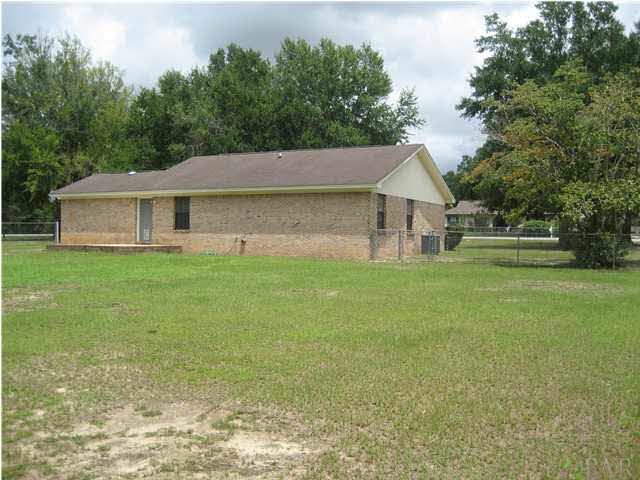 5675 Beale Ford Road Pace, FL 32571 - Photo 14 of 16 Back of house with open patio