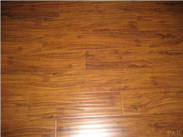 5675 Beale Ford Road Pace, FL 32571 - Photo 16 of 16 New wood laminate flooring in Living Room and Dining Room