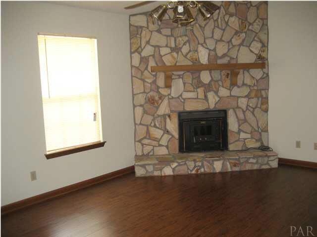 5675 Beale Ford Road Pace, FL 32571 - Photo 4 of 16 Living Room with Fireplace
