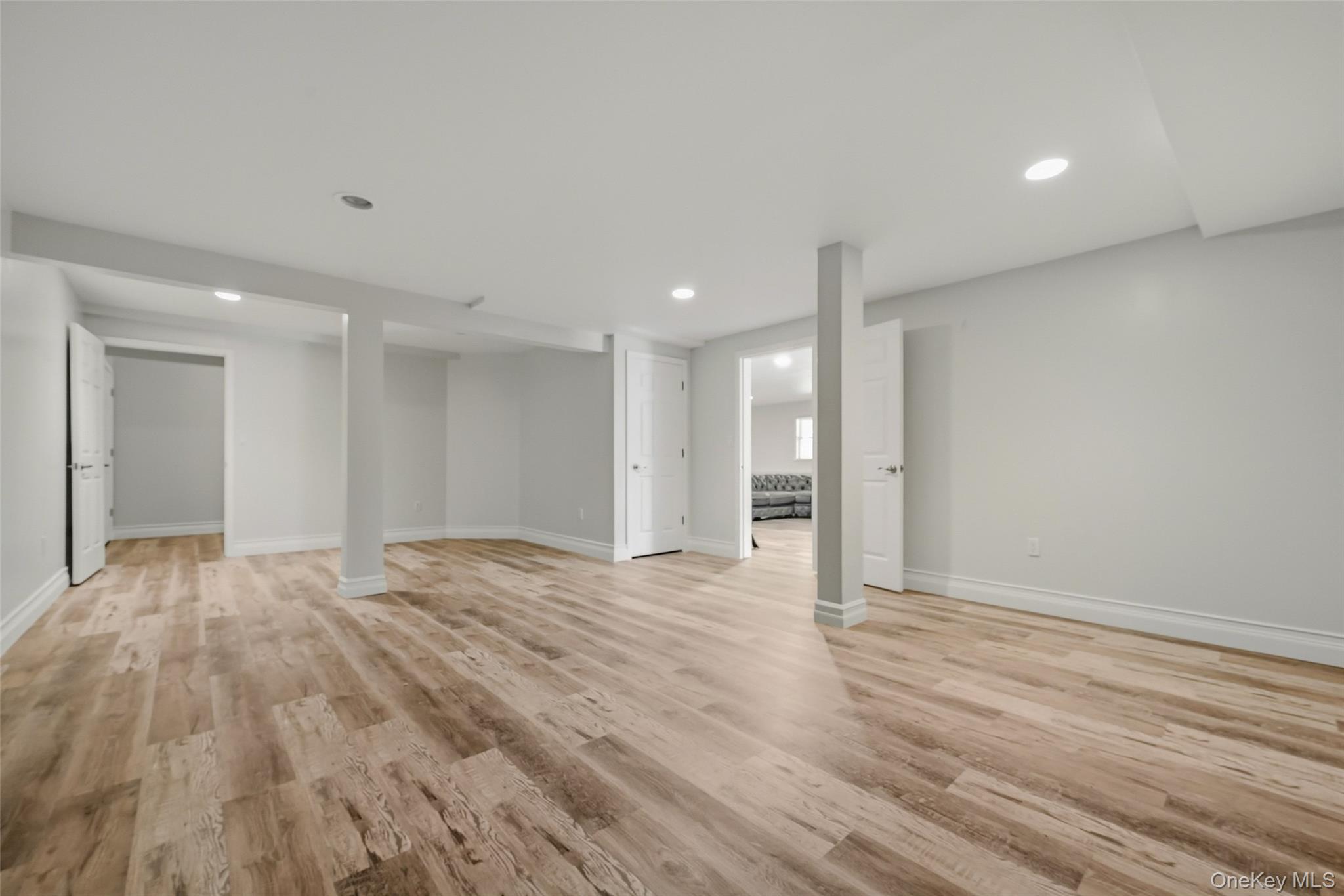 51 Meriwether Trail Congers, NY 10920 - Photo 40 of 50 Spacious room featuring wood-finish flooring, recessed lighting, neutral paint, white trim, and white doors