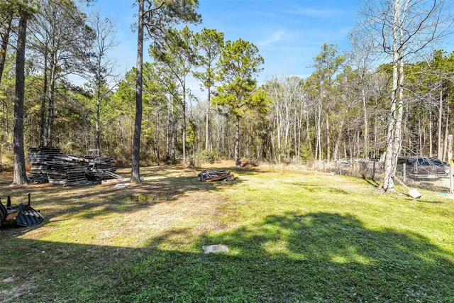 a view of a swimming pool with an outdoor space