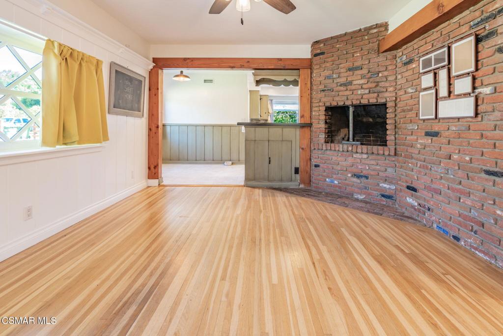 4310 Eve Road Simi Valley, CA 93063 - Photo 13 of 50 a view of an empty room with a window and wooden floor