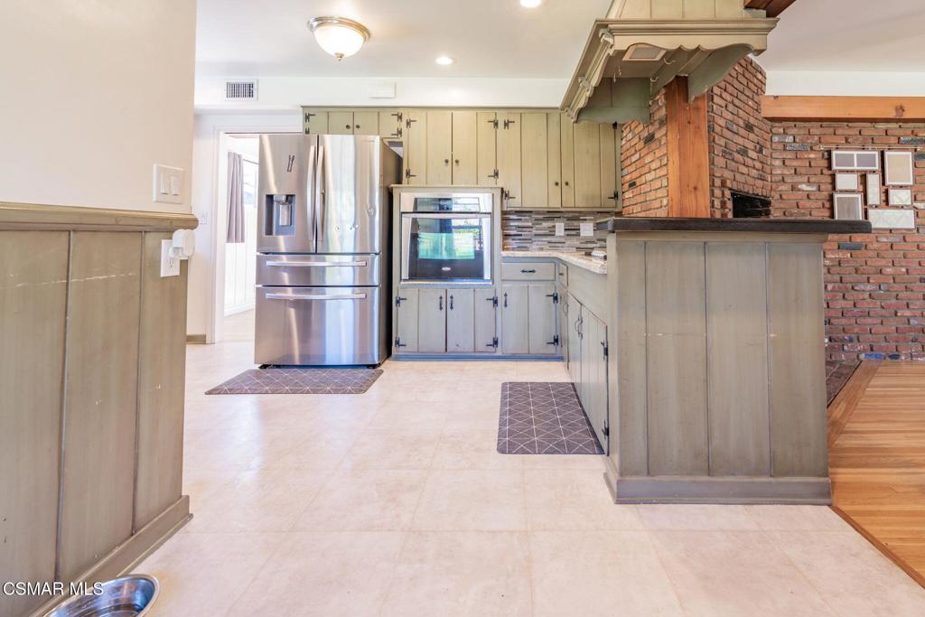 4310 Eve Road Simi Valley, CA 93063 - Photo 14 of 50 a view of kitchen with refrigerator and window