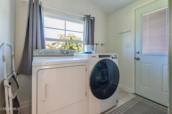 a view of a bathroom from a hallway