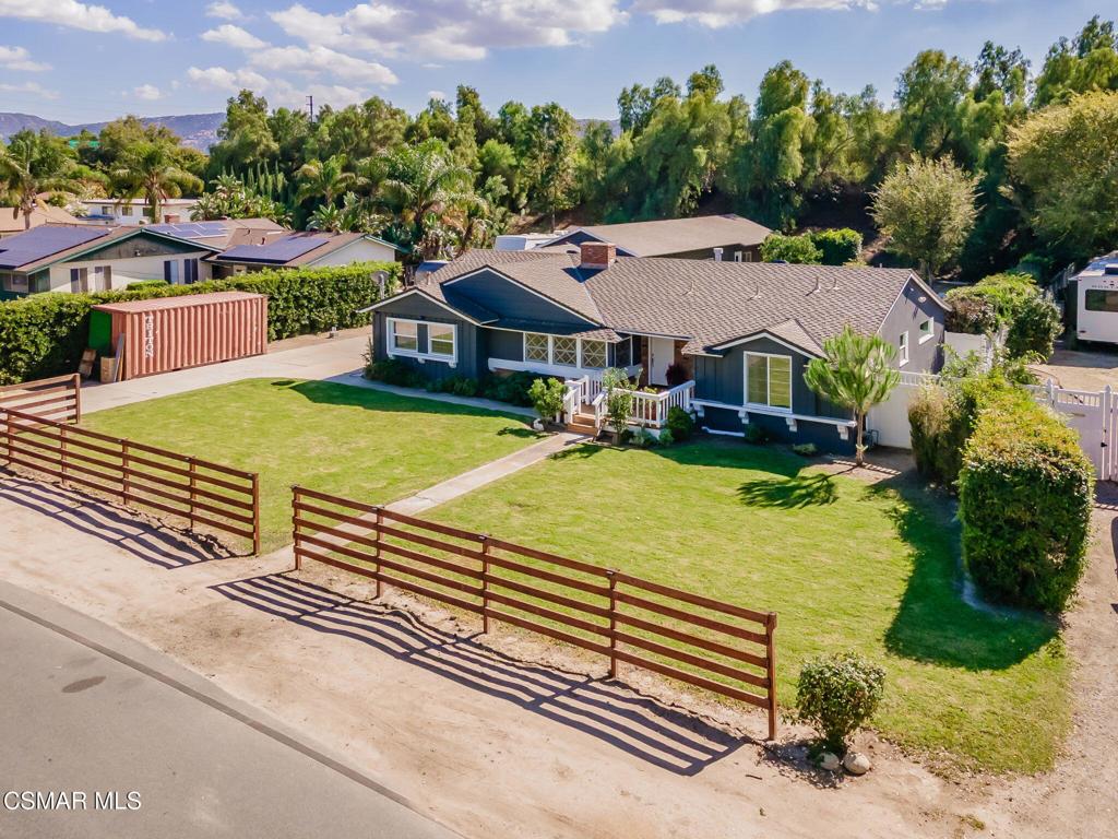 4310 Eve Road Simi Valley, CA 93063 - Photo 2 of 50 an aerial view of a house with swimming pool and large trees
