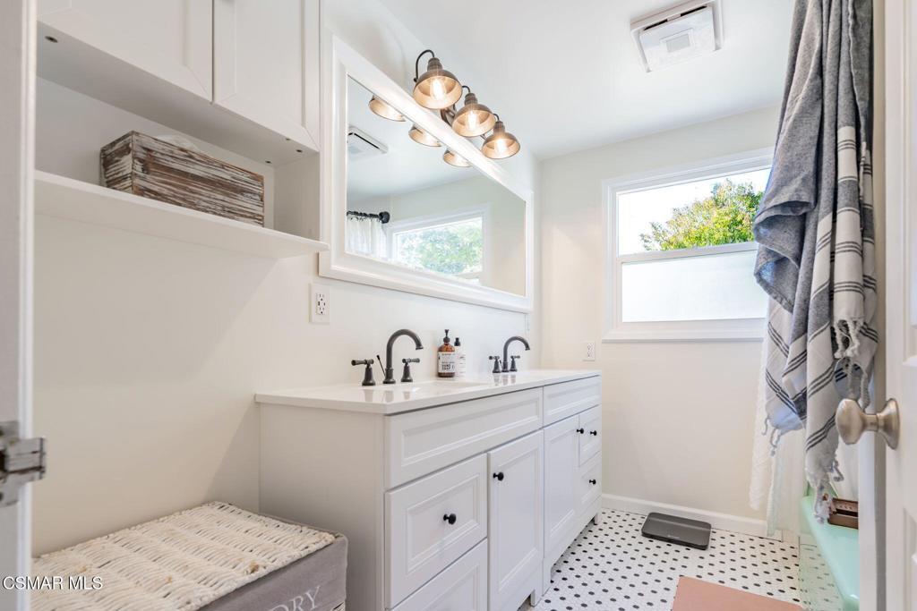 4310 Eve Road Simi Valley, CA 93063 - Photo 25 of 50 a bathroom with a sink and a mirror