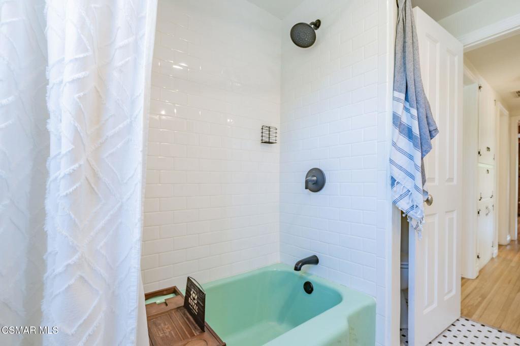 4310 Eve Road Simi Valley, CA 93063 - Photo 26 of 50 a bathroom with a tub and a shower
