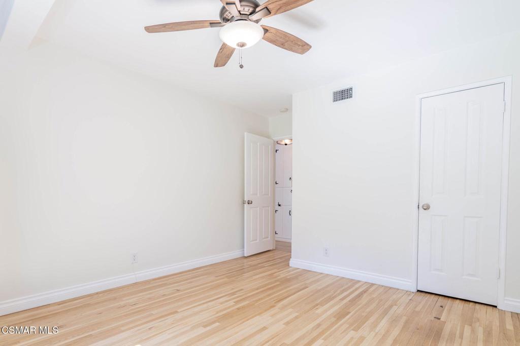 4310 Eve Road Simi Valley, CA 93063 - Photo 30 of 50 a view of an empty room with wooden floor