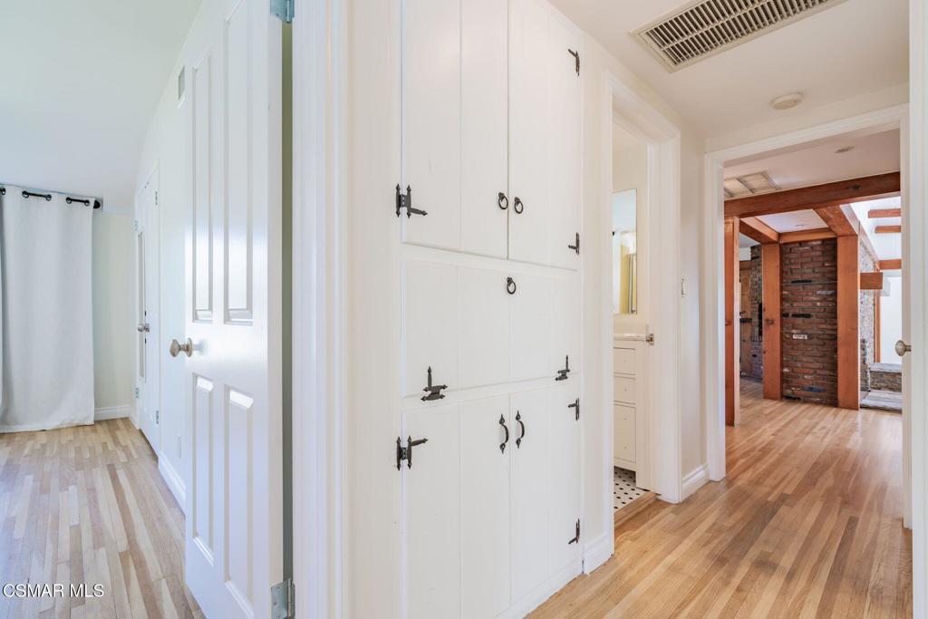 4310 Eve Road Simi Valley, CA 93063 - Photo 33 of 50 a view of a hallway with wooden floor