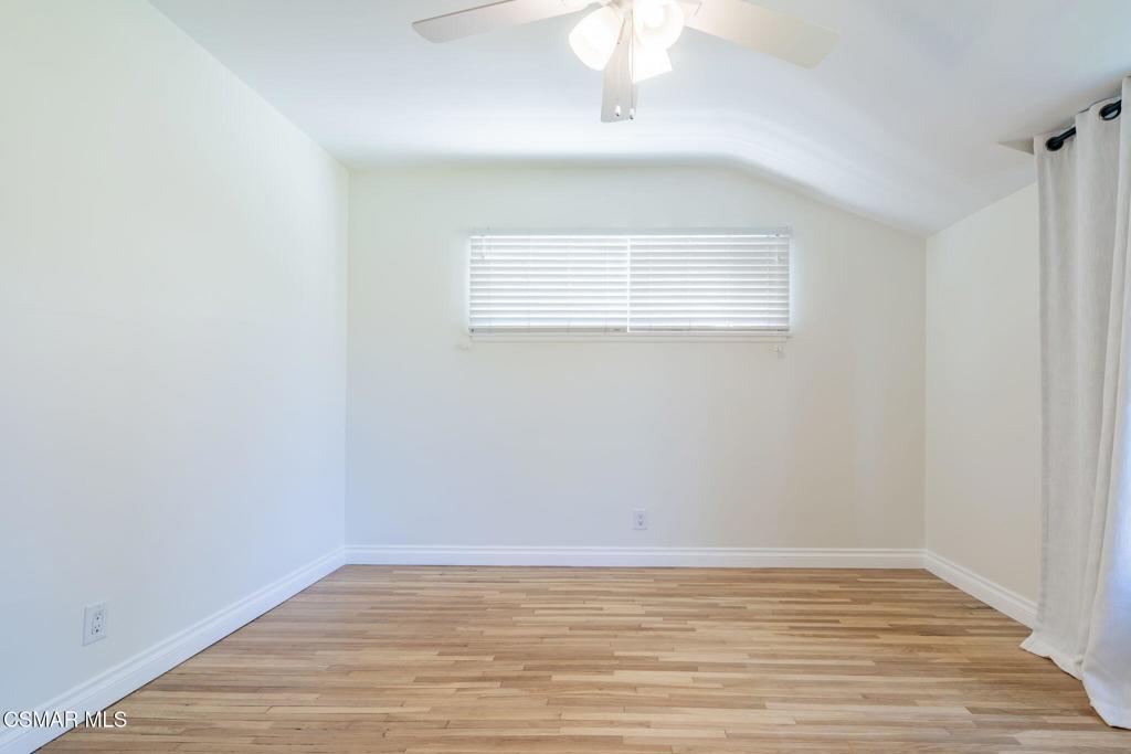4310 Eve Road Simi Valley, CA 93063 - Photo 35 of 50 a view of an empty room with wooden floor and a window
