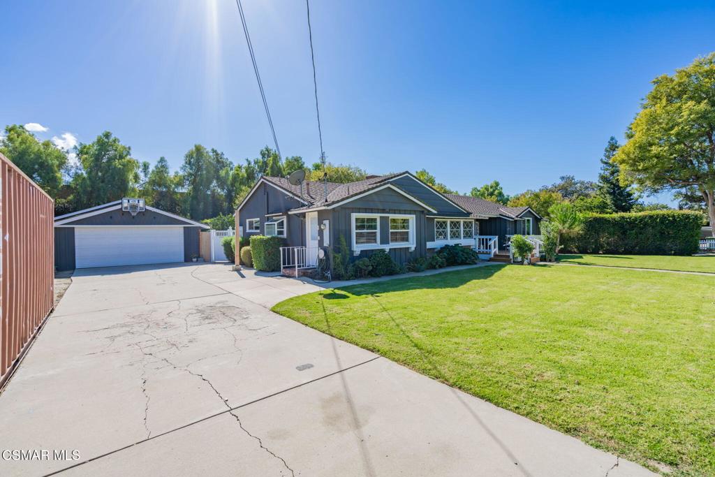 4310 Eve Road Simi Valley, CA 93063 - Photo 41 of 50 a front view of house with yard and green space