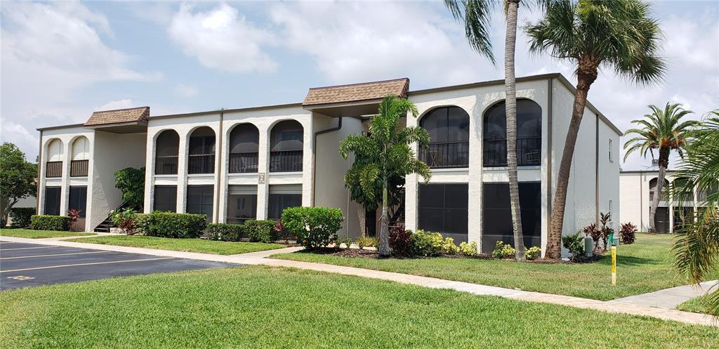 front view of a building with a yard