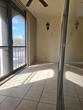 a view of a hallway with a glass door