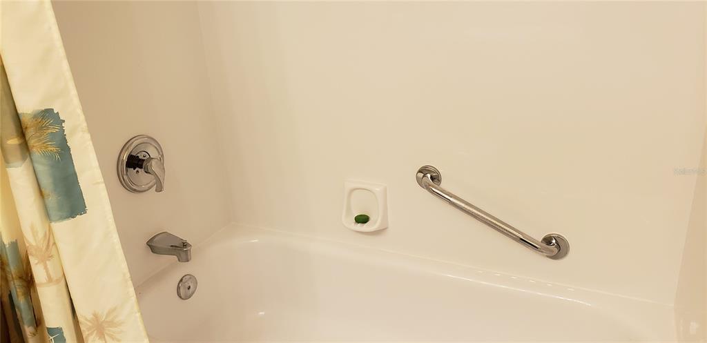 7701 Starkey Road, Unit 102 Seminole, FL 33777 - Photo 6 of 24 a bathroom with a shower