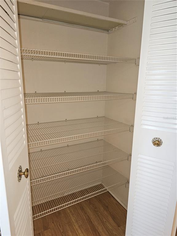 7701 Starkey Road, Unit 102 Seminole, FL 33777 - Photo 10 of 24 a bathroom with a glass shower door
