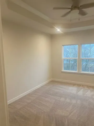 en empty room with windows