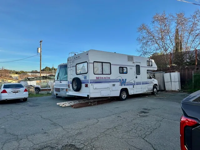 a view of cars parked in a parking lot