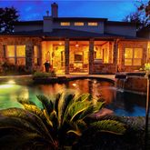 a view of a swimming pool with an outdoor seating