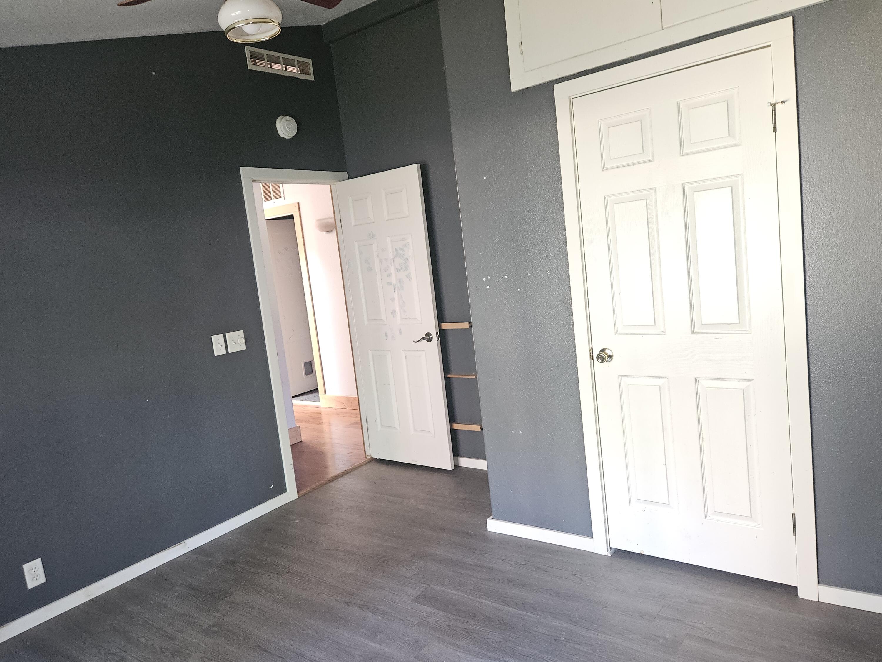 18015 Freight Rd Lane Klamath Falls, OR 97601 - Photo 15 of 24 an empty room with wooden floor and a window