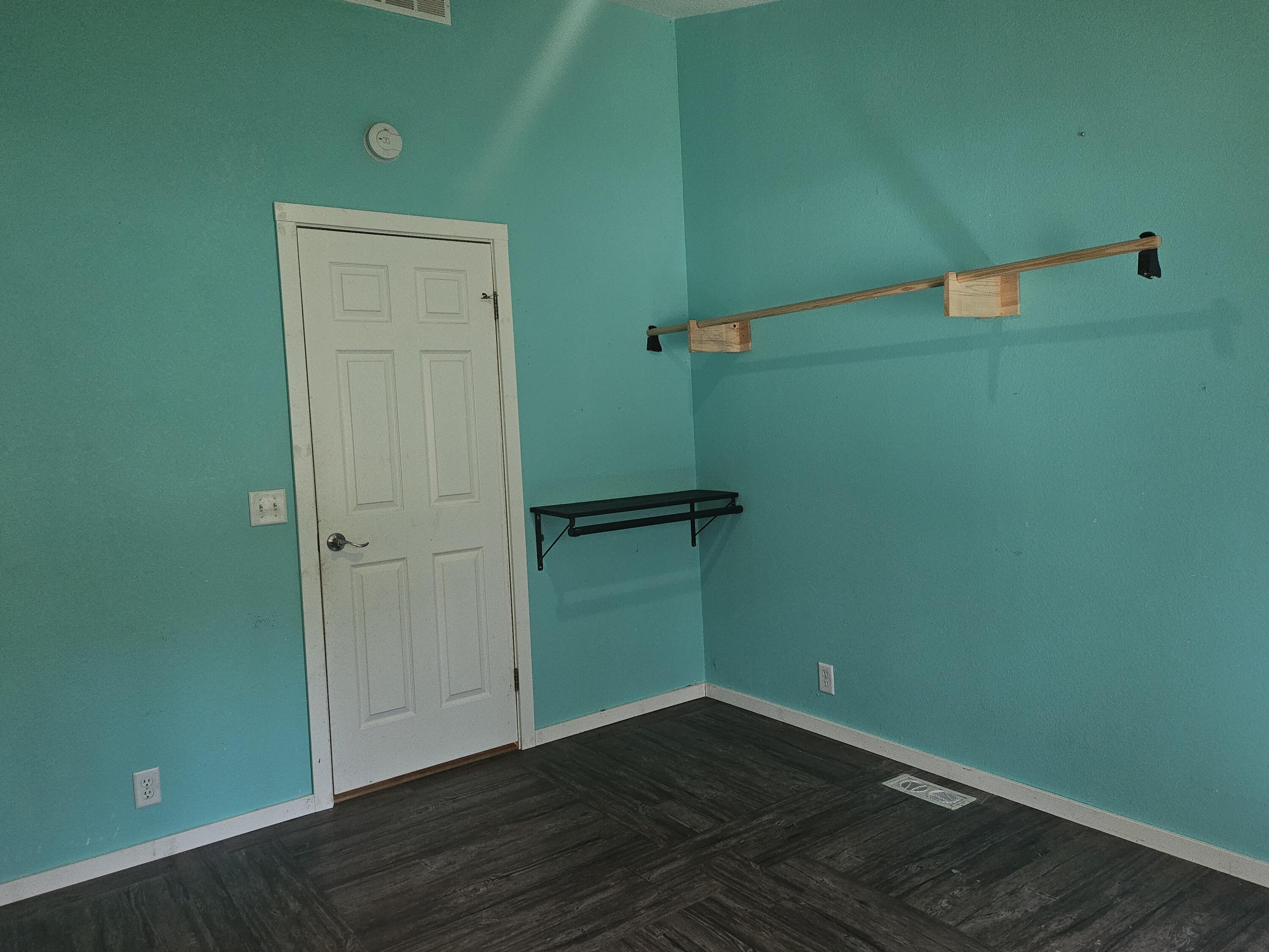 18015 Freight Rd Lane Klamath Falls, OR 97601 - Photo 16 of 24 an empty room with wooden floor and closet