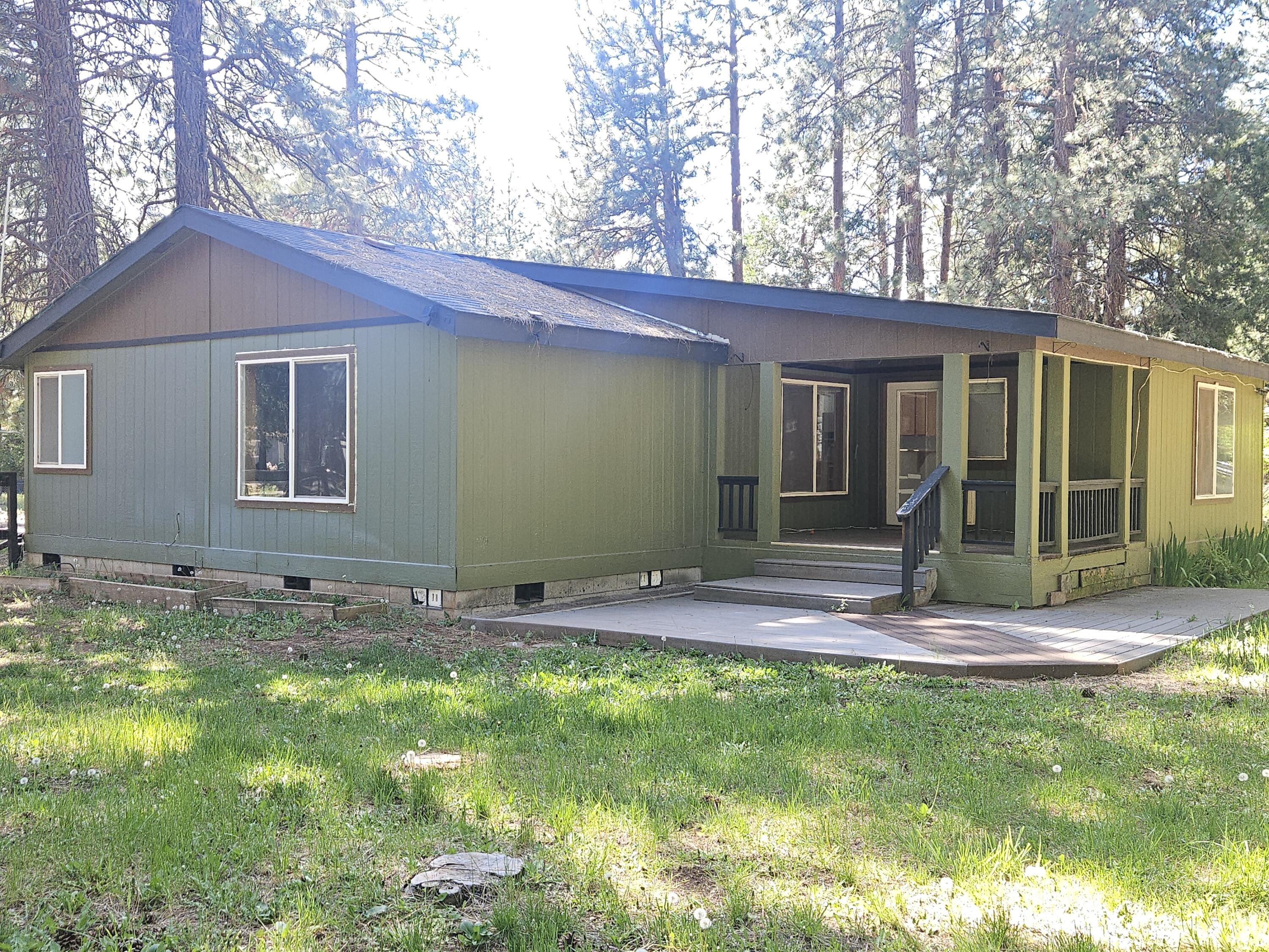 18015 Freight Rd Lane Klamath Falls, OR 97601 - Photo 2 of 24 a view of a house with yard and entertaining space