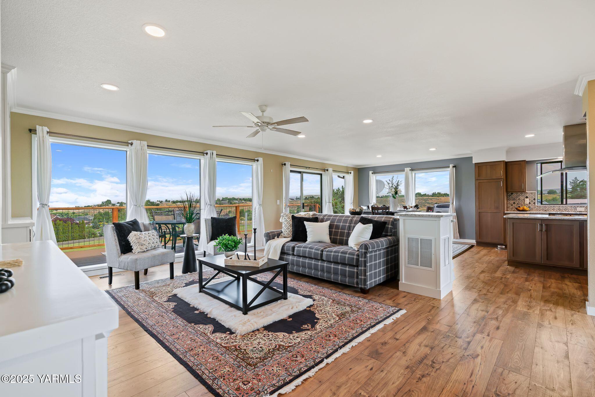 283 Cook Road Yakima, WA 98908 - Photo 13 of 64 a living room with furniture dining area and a large window