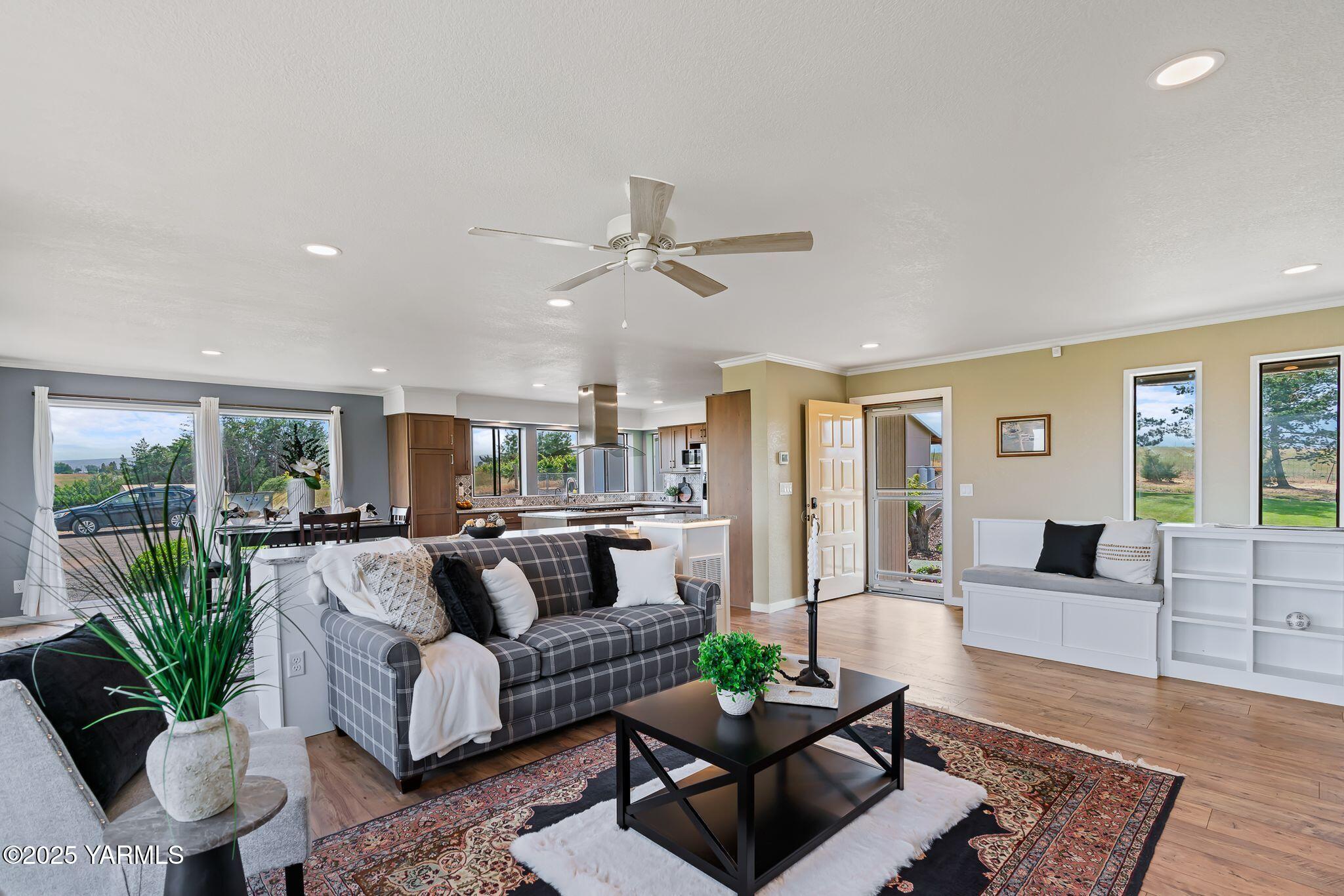 283 Cook Road Yakima, WA 98908 - Photo 17 of 64 a living room with furniture ceiling fan and a rug