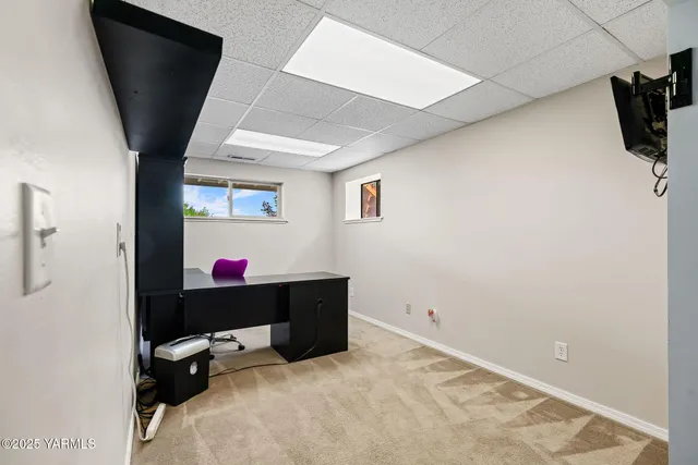 a view of a yard with sitting area