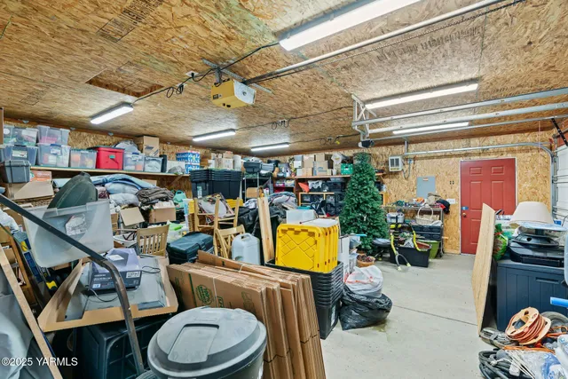 an aerial view of a city with lots of residential buildings lake and ocean view