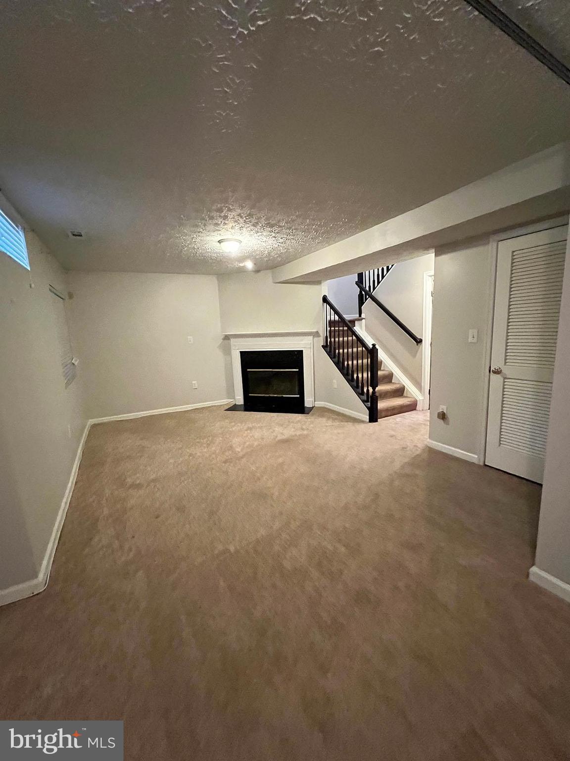 8334 Lyndhurst Street Laurel, MD 20724 - Photo 13 of 16 a view of a room with wooden floor